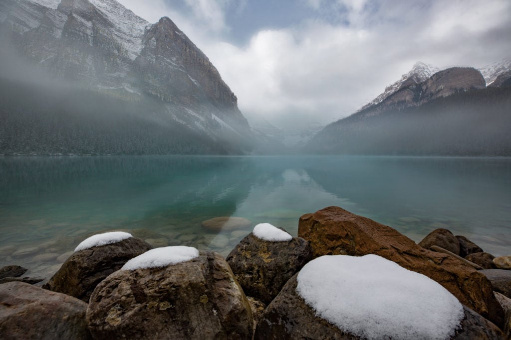 Fog fading over Lake Louise after fresh snow