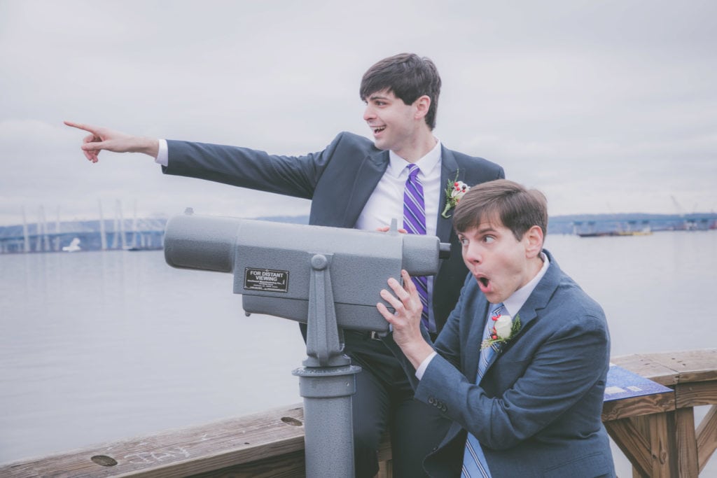 Two grooms goof off during their NY elopement.