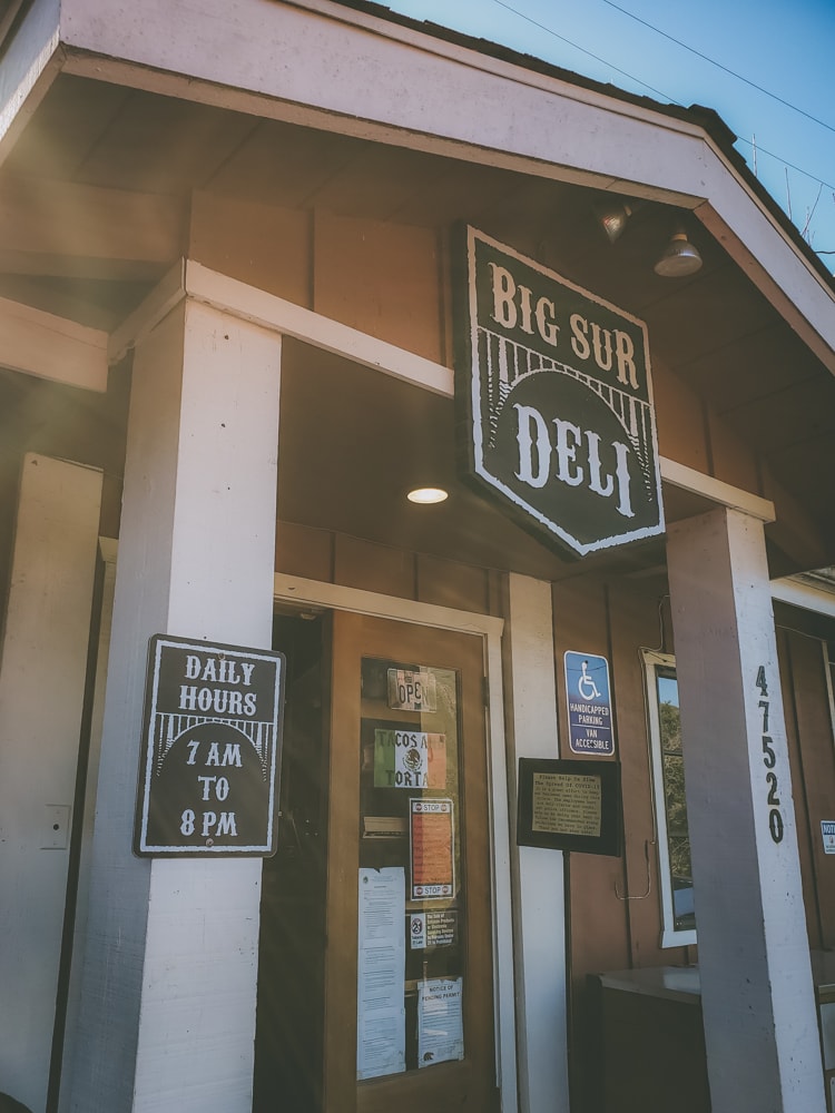 An exterior view of the front door and signage for the Big Sur Deli