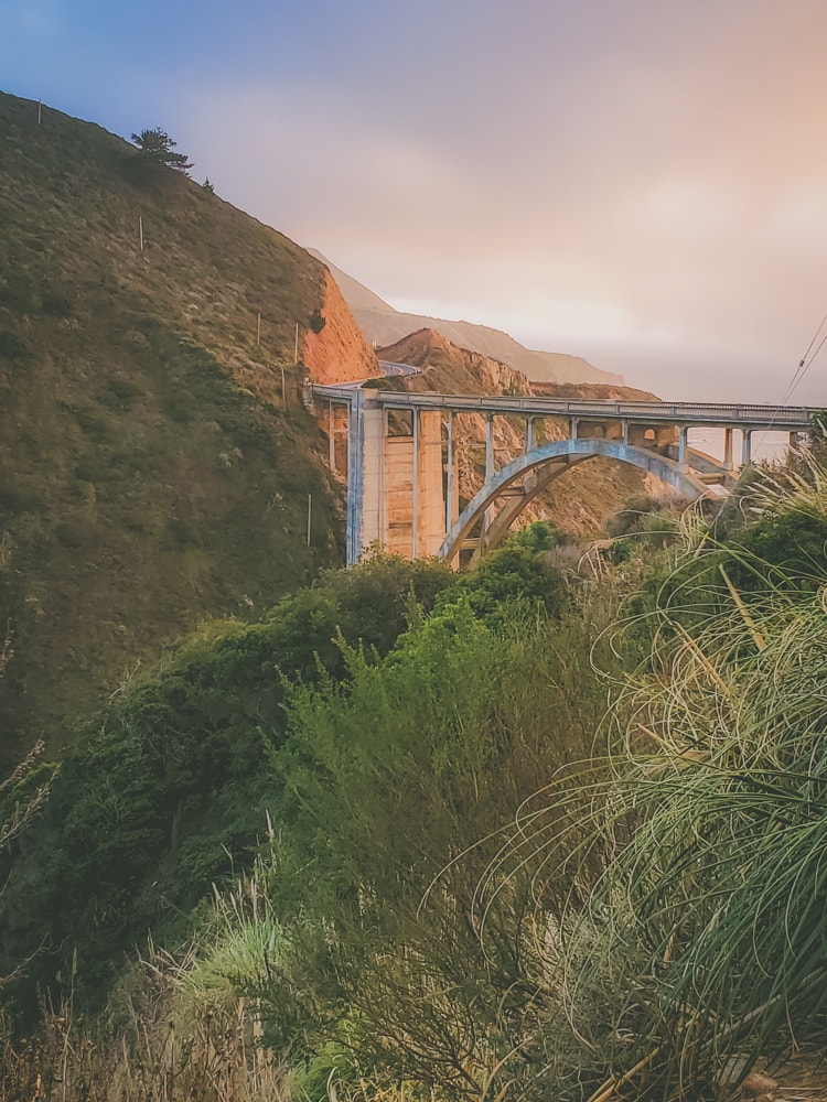 Inland view of the Bixby Creek Bridge in Big Sur, California