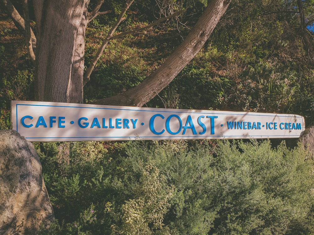 The sign for Coast Big Sur, a stop that offers a cafe, gallery, wine bar and ice cream. All of those things are great!