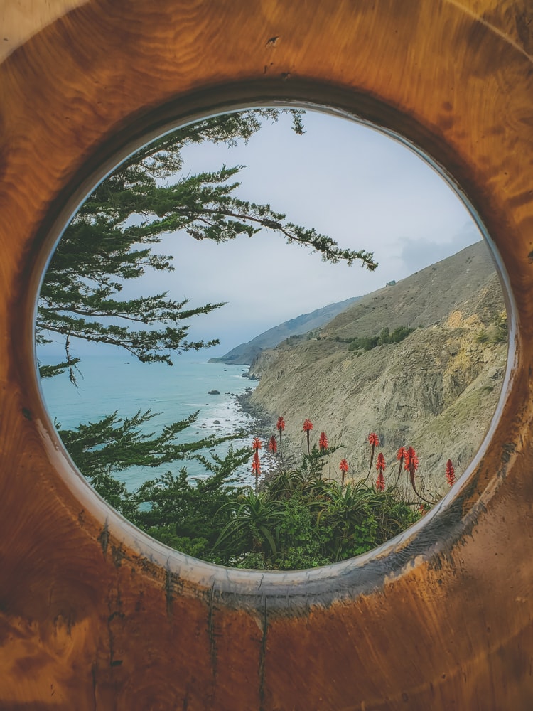 A view of the coast looking north through the Portal to Big Sur art installation at Ragged Point