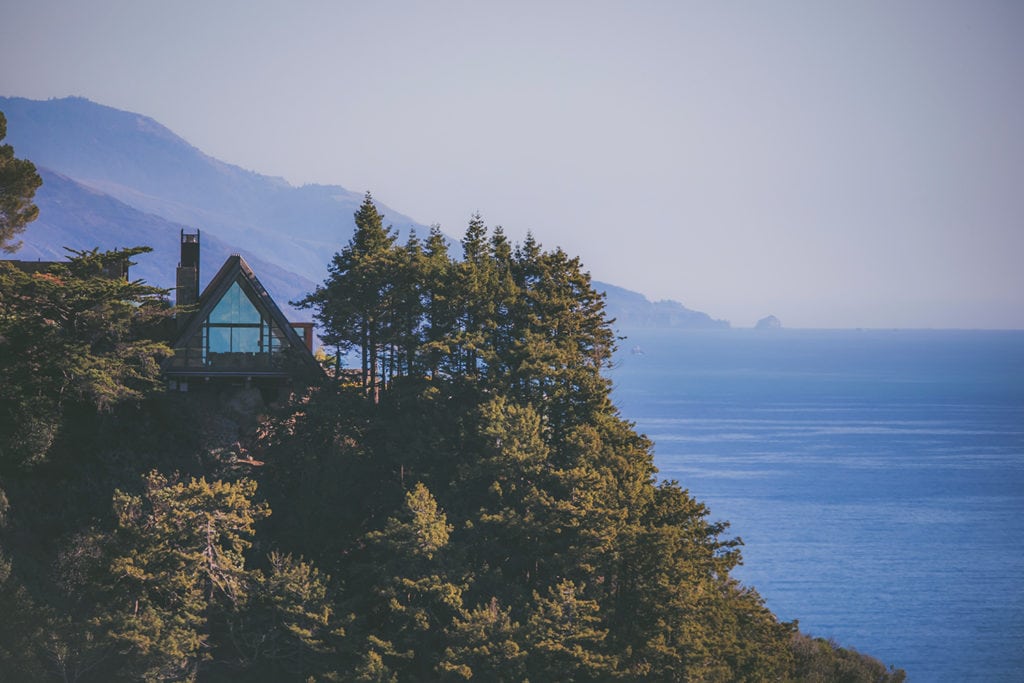 A roadside view of the Wild Bird home in Big Sur, a gorgeous house situated 600 feet above the ocean.