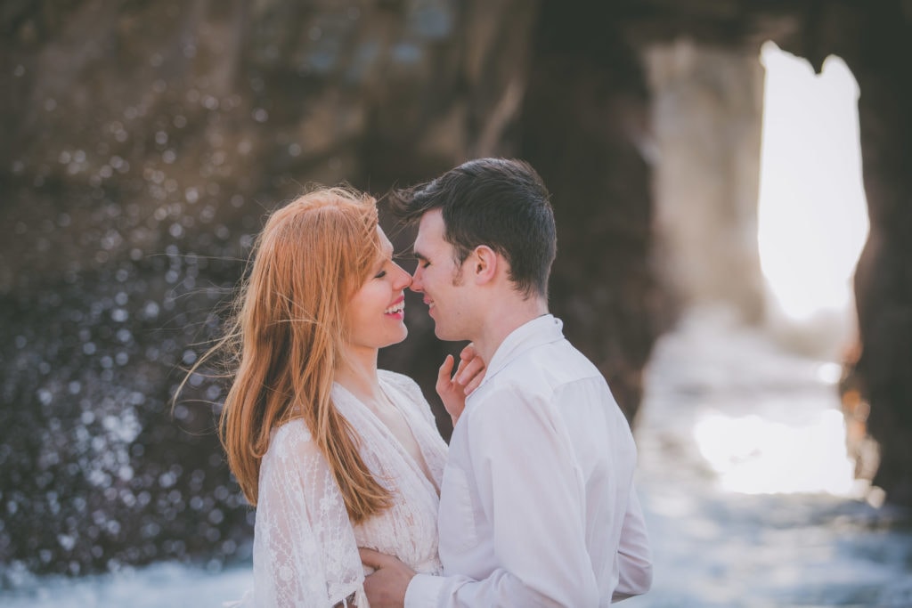 A couple almost kisses during their elopement in Big Sur.